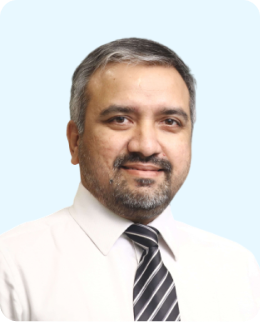 A profile picture of Dr. Joy Varghese, Senior Consultant Neuro Specialist.